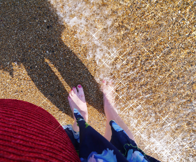 Feet Paddling in the Sea