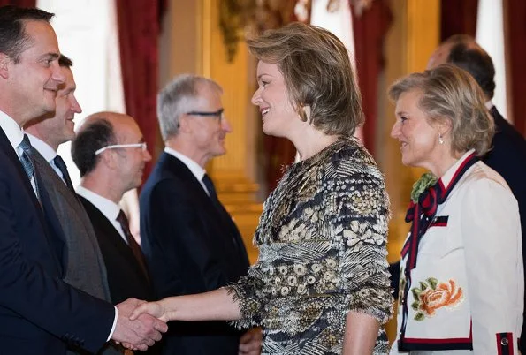 Princess Astrid wears Gucci skirt suit. Queen Mathilde and Princess Astrid attended a New Year's reception