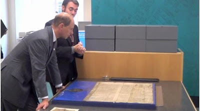 Paul Stebbing shows Prince Edward a huge document placed on the map table, erected by my OH, in the Archives