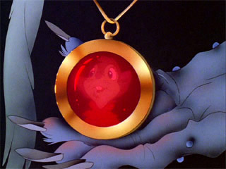 Nicodemus holding the amulet Secret of NIMH 1982 animatedfilmreviews.filminspector.com