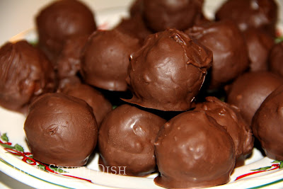 Another old fashioned heritage confection, Martha Washington Candy is a rich mixture of buttery coconut and condensed milk with pecans, rolled into a tight ball and dipped in chocolate.