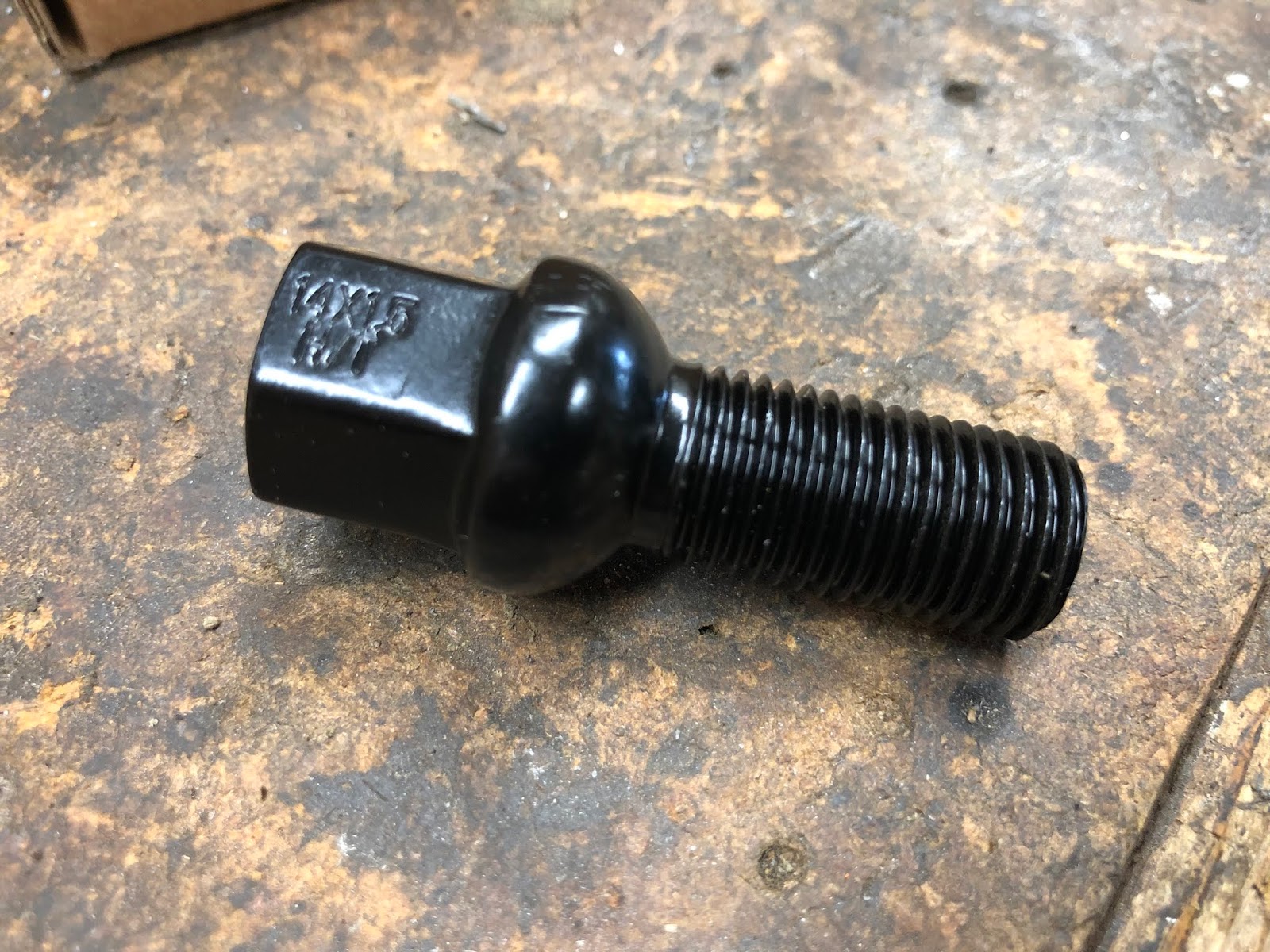 Using a VW Lug Bolt as a Puller to Remove a Honda CT90 Generator Rotor