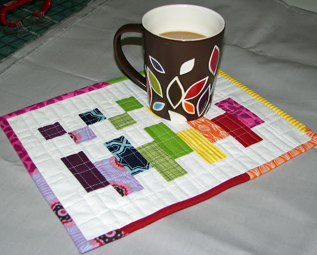 “Scrappy COLORBLOCK” Free Quilted Mug Rug Pattern designed by Terri from Sew Fantastic