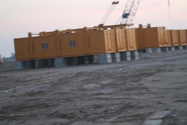 Picture of yellow construction trailers on the Kingdom Tower construction site