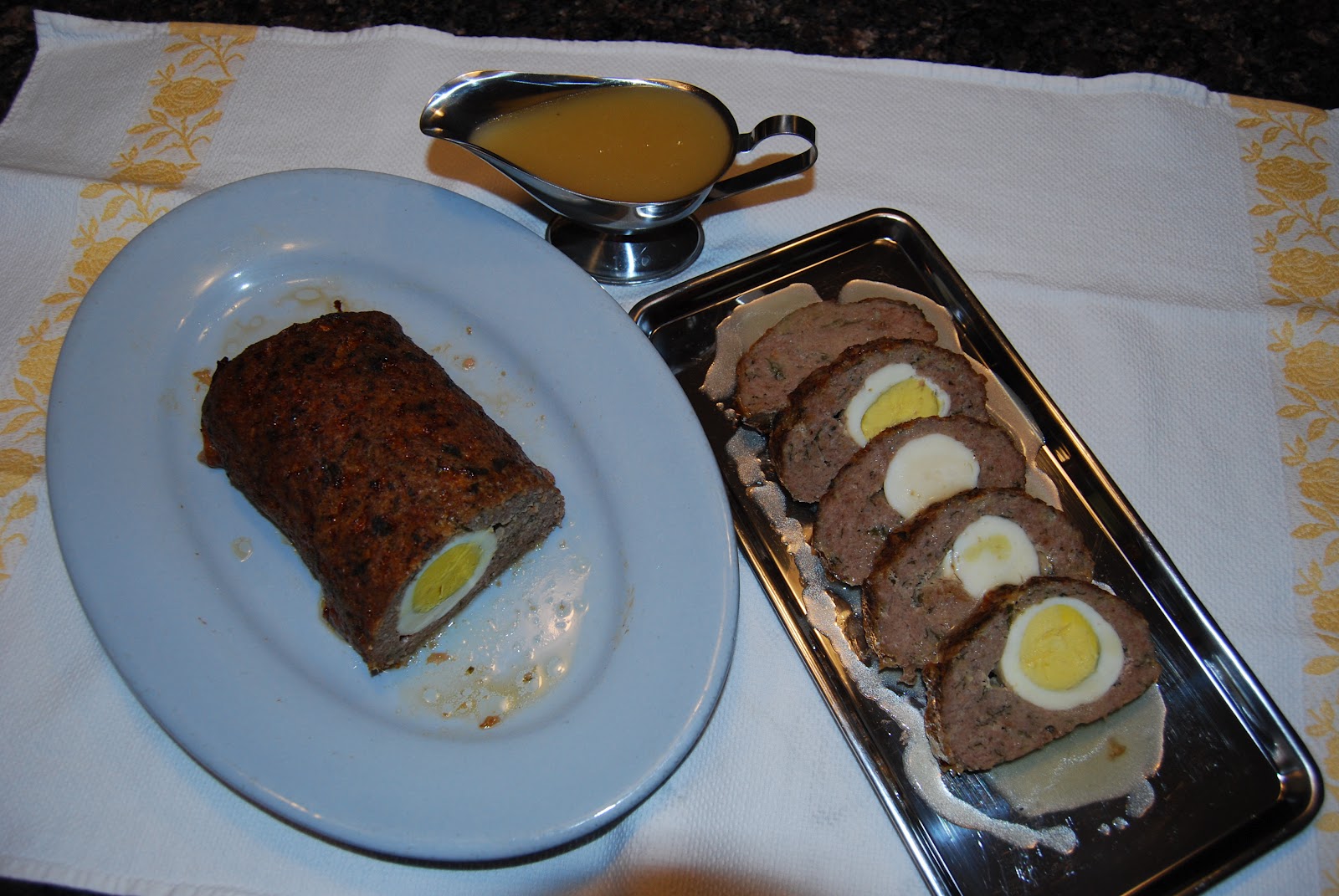 Greek Fusion Cuisine Meatloaf stuffed with hard boiled eggs