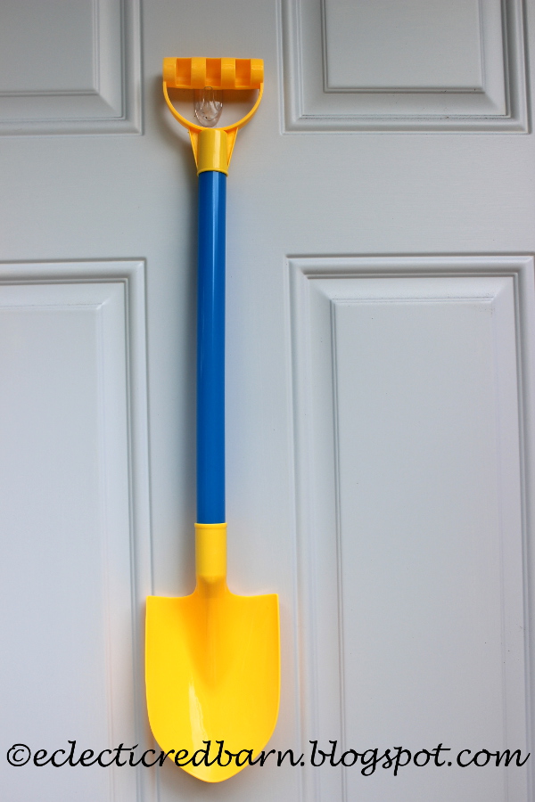 Eclectic Red BarnPlastic Shovel from the Dollar Tree