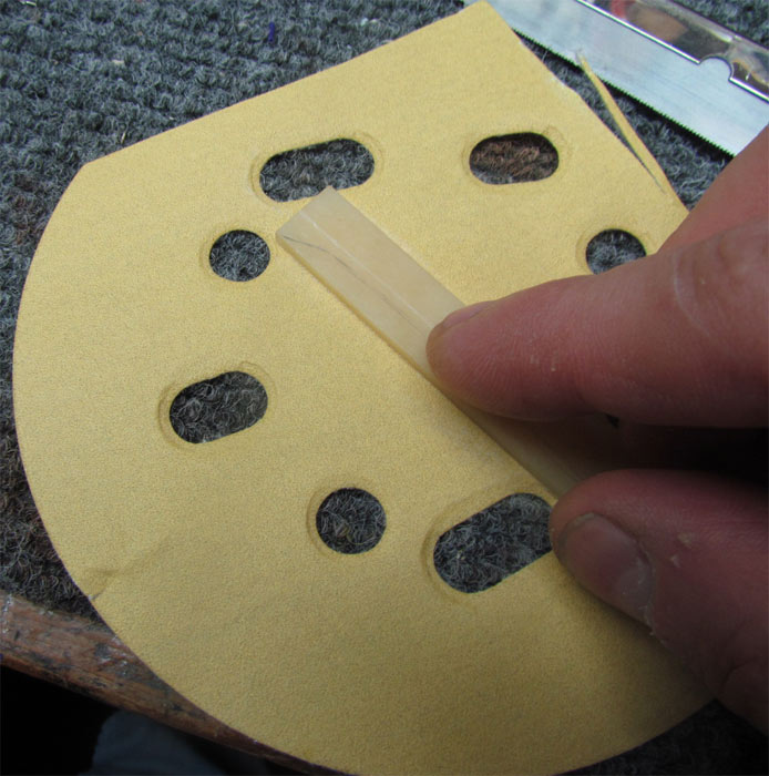 Bone Saddle for the Silvertone Baritone Ukulele Crawls Backward (When