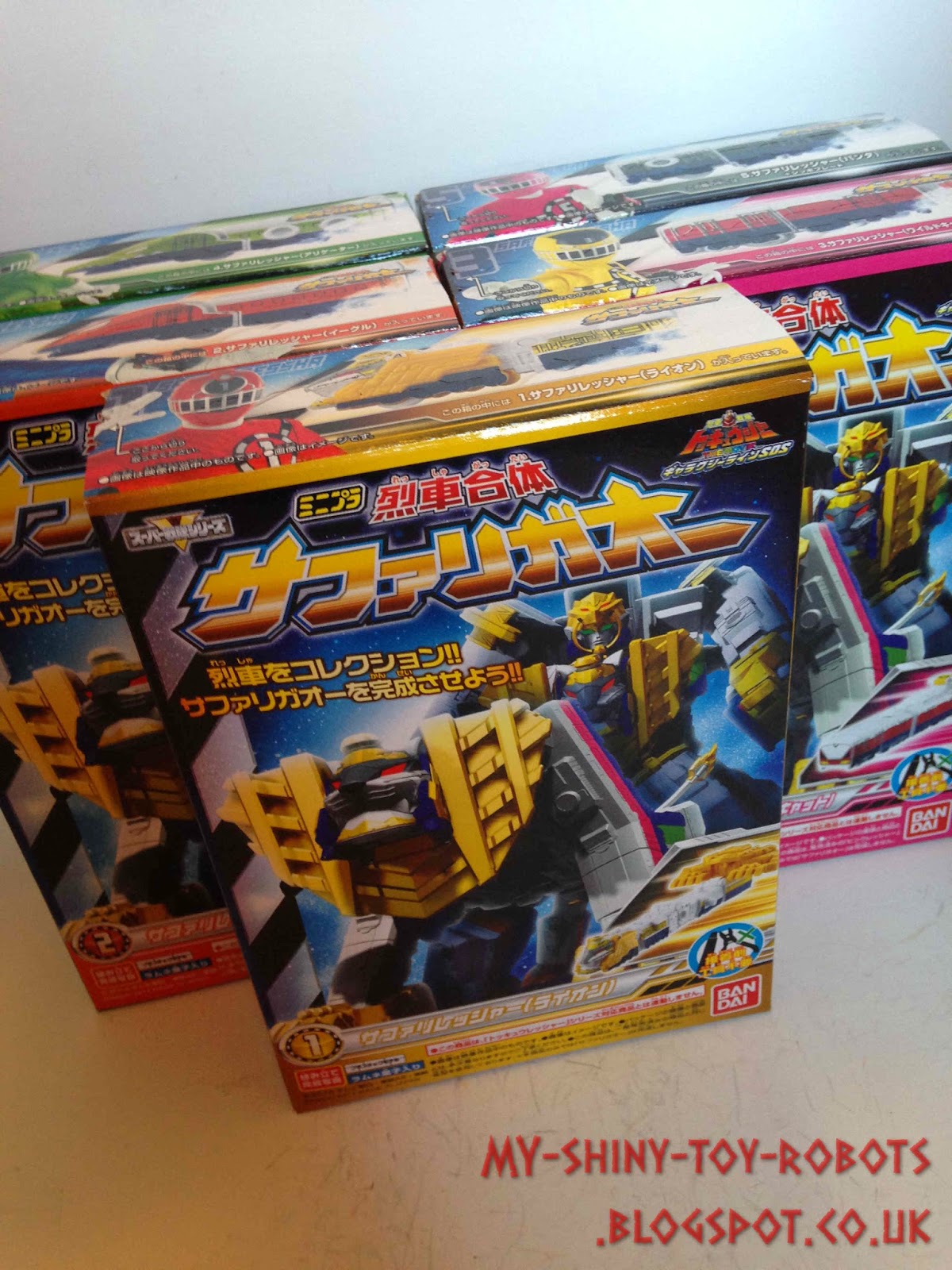 The five model kits in their boxes