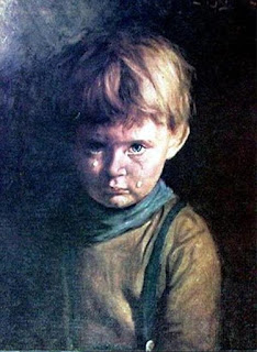 Crying boy painting