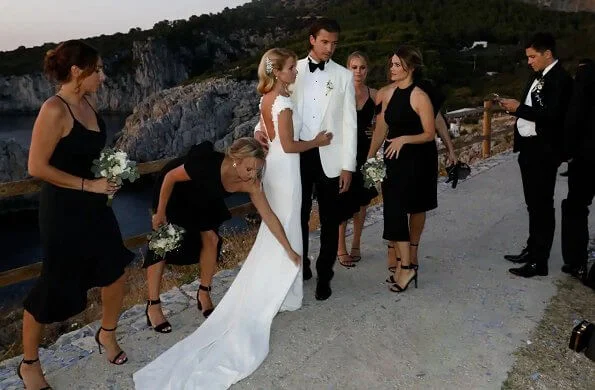 The wedding took place on Capri island. Prince Alexander and Gabriel. Carolina Pihl is the godparent. wedding dress