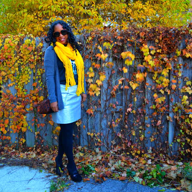 yellow scarf worn with grey cardigan