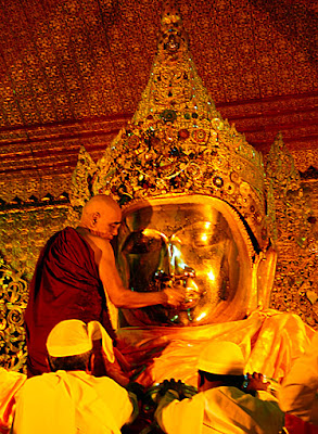 Mahamuni Buddha face washing ceremony Mahamuni Buddha face washing ceremony