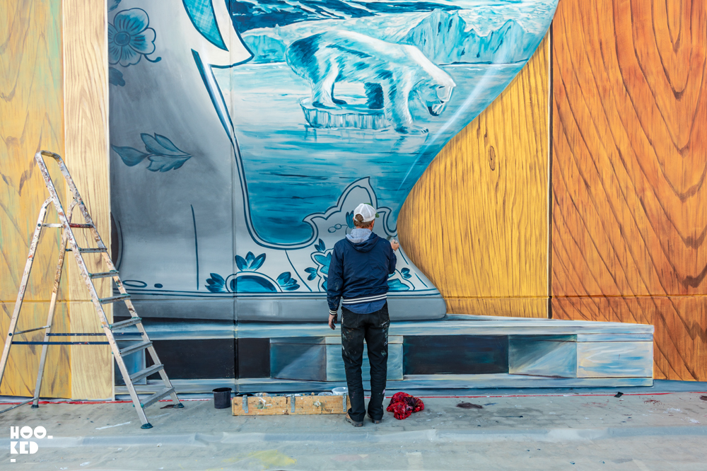 Dutch Artist Leon Keer at work on a 3D street art Mural by in Ostend, Belgium