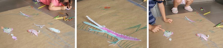 Peces en el lago del juego de pesca con clips