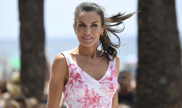 Queen Letizia wore Adolfo Dominguez floral print dress. Macarena espadrille wedges. Levante beach in Benidorm