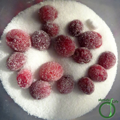 Morsels of Life - Sugared Cranberries Step 5 - Roll cranberries around in sugar until coated and sparkly.
