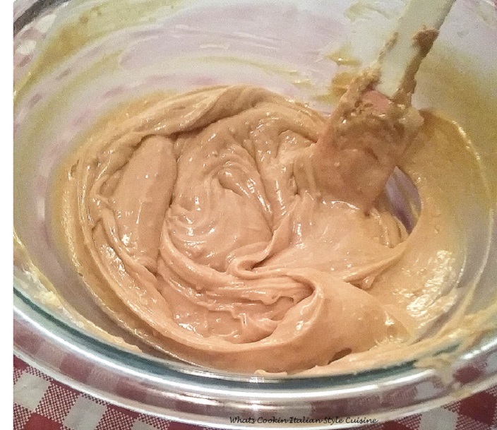 a peanut butter whipped filling smooth and in a glass bowl