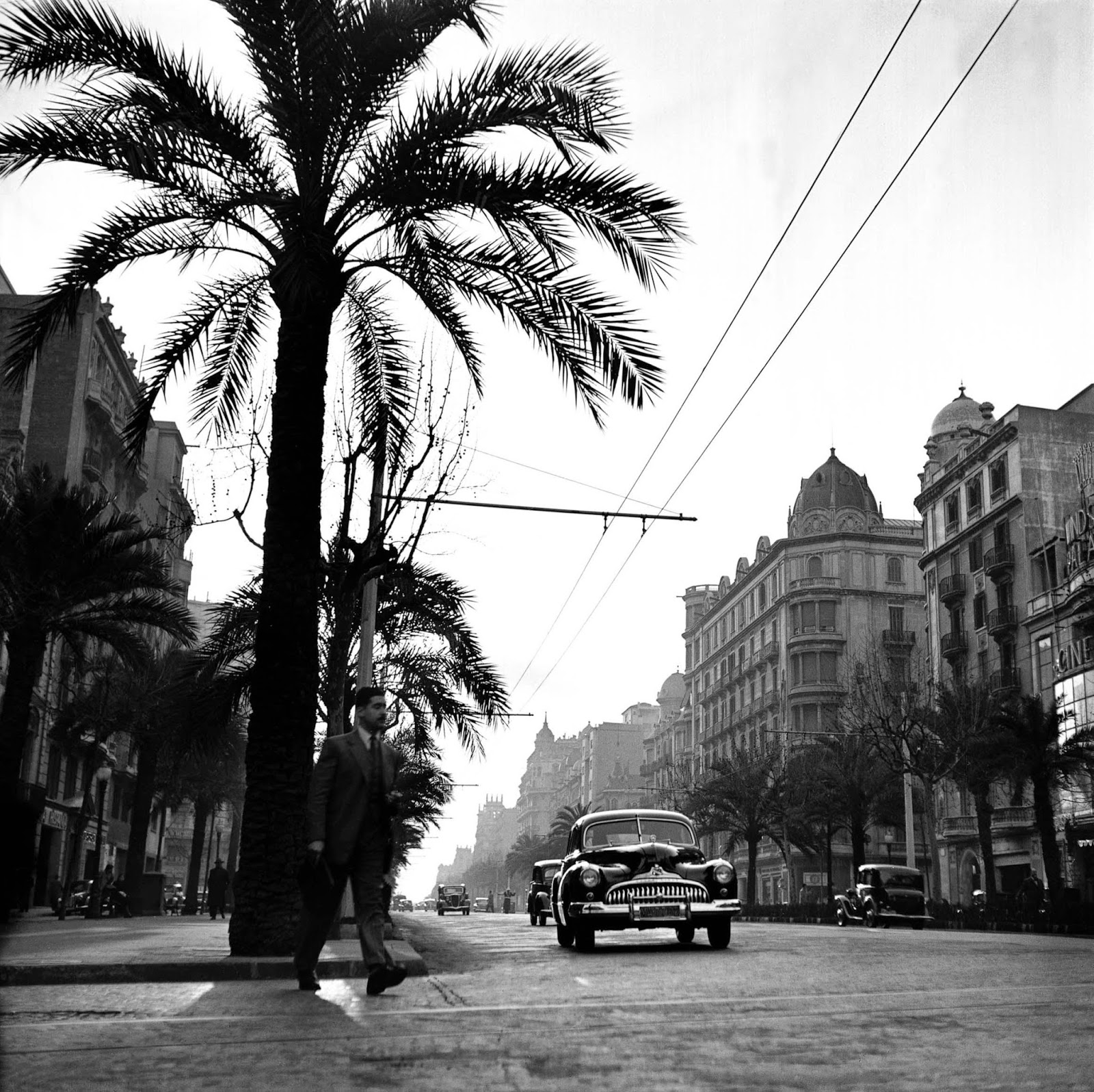 Below is a collection of amazing black and white photographs of madrid and barcelona of the 1950s taken by francesc català roca showing the street scenes