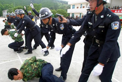 Chinese police officers rehearsing execution procedures