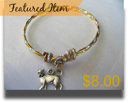 gold and silver cat  charm bracelet 