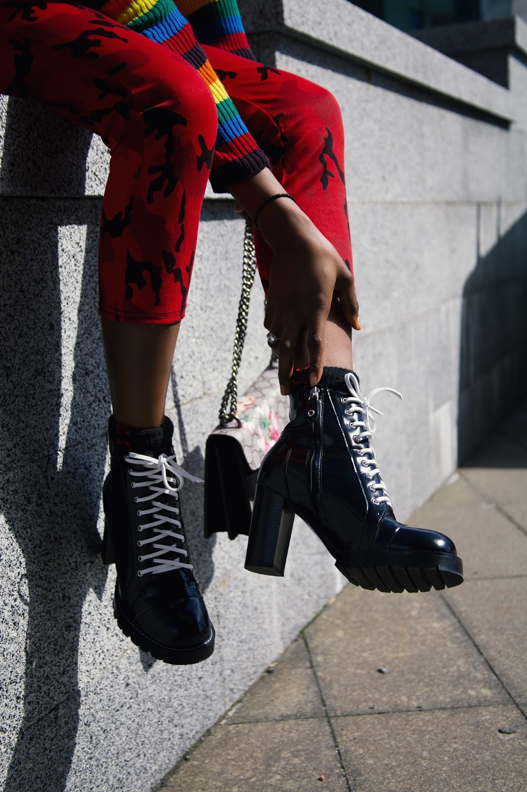 Melody Jacob: Louis Vuitton star trail ankle boots.
