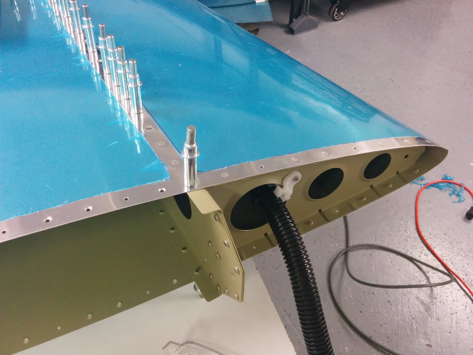 Damazio family's RV10 project Vertical stabilizer skin riveting started