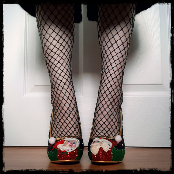 Irregular Choice Mr & Mrs Clause front front view of feet wearing metallic fishnet tights and Santa and Mrs Claus shoes