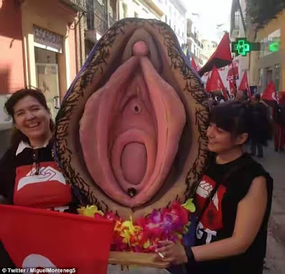 00 Spanish women charged with religious offence after they carried a plastic vagina though a city to protest homophobia
