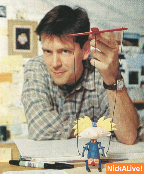 Craig-Bartlett-Creator-Of-Hey-Arnold-With-Arnold-Shortman-Puppet-Animator-Draws-Football-Head-Sketch-Top-Toon-Talent-Ooze-News-Nickelodeon-Magazine-Nick-Mag-December-1996_2.png