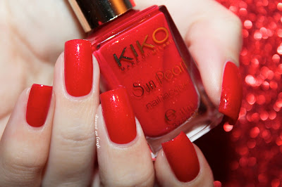 Swatch of the nail polish 430 - Chili Pepper Red de Kiko