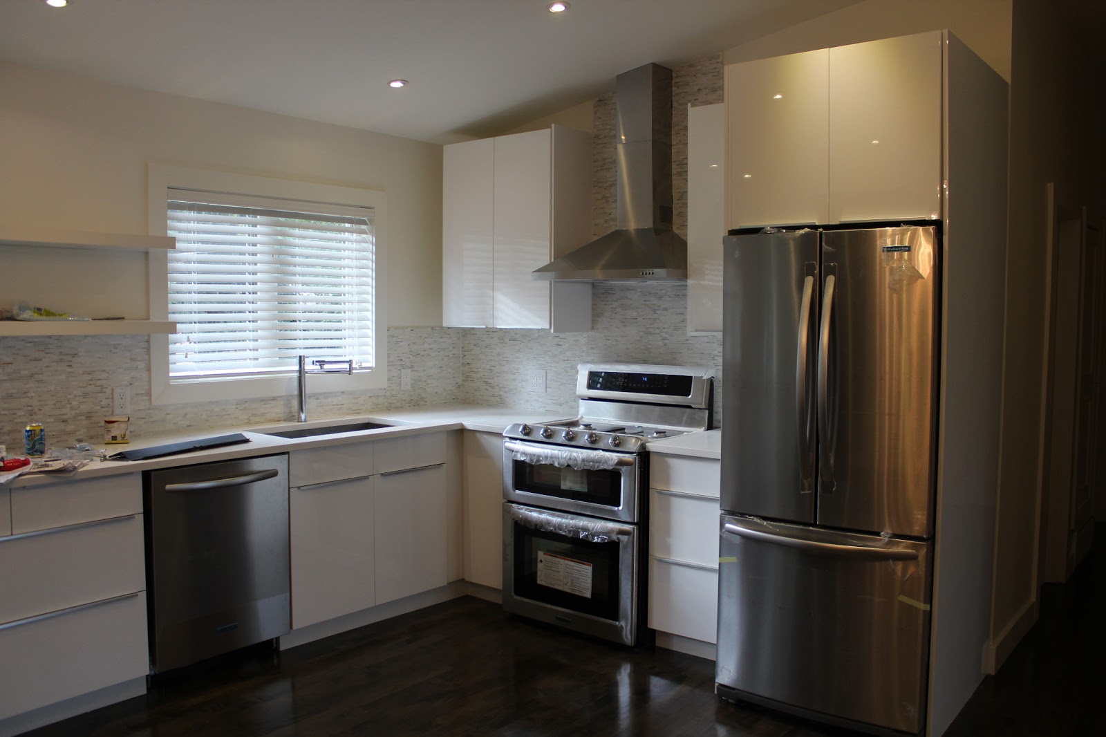 pretty swanky digs ikea abstrakt (white high gloss) kitchen in progress