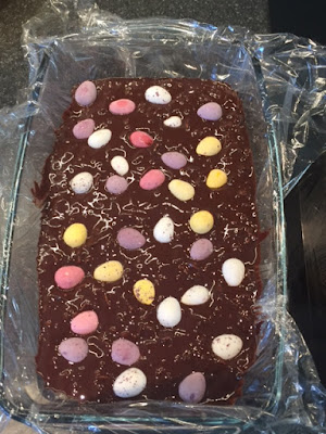 Easter Chocolate Fridge Cake chocolate mixture with mini eggs pressed in