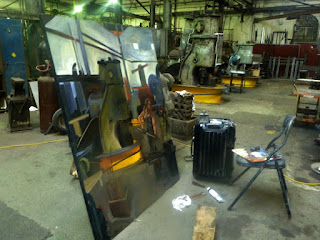 oil painting of blacksmith from 'Wrought Artworks' at the Australian Technology Park, Eveleigh Railway workshops by industrial heritage artist Jane Bennett