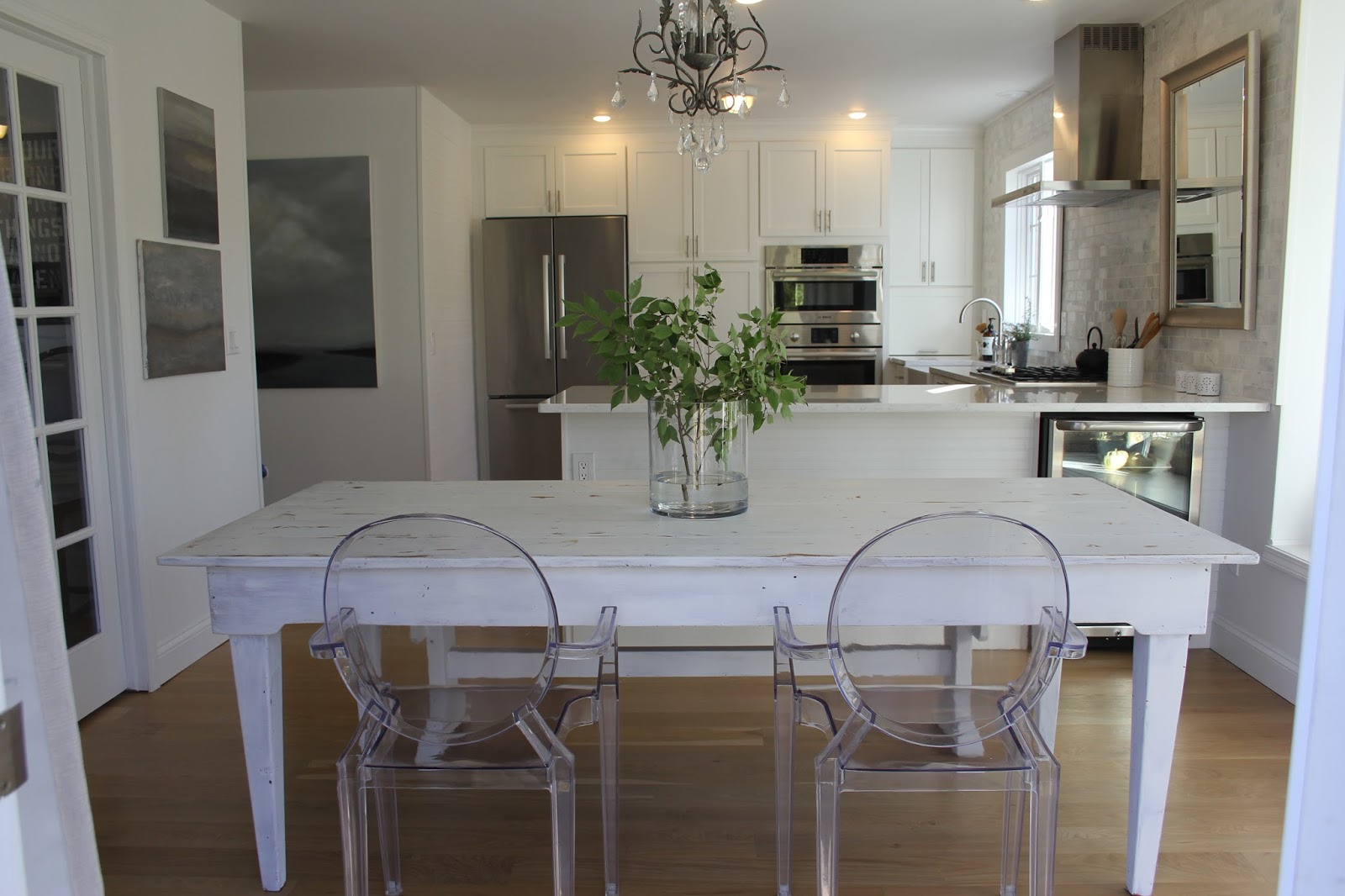 hello-lovely-studio-fixer-upper-white-kitchen-spare-farmhouse-table