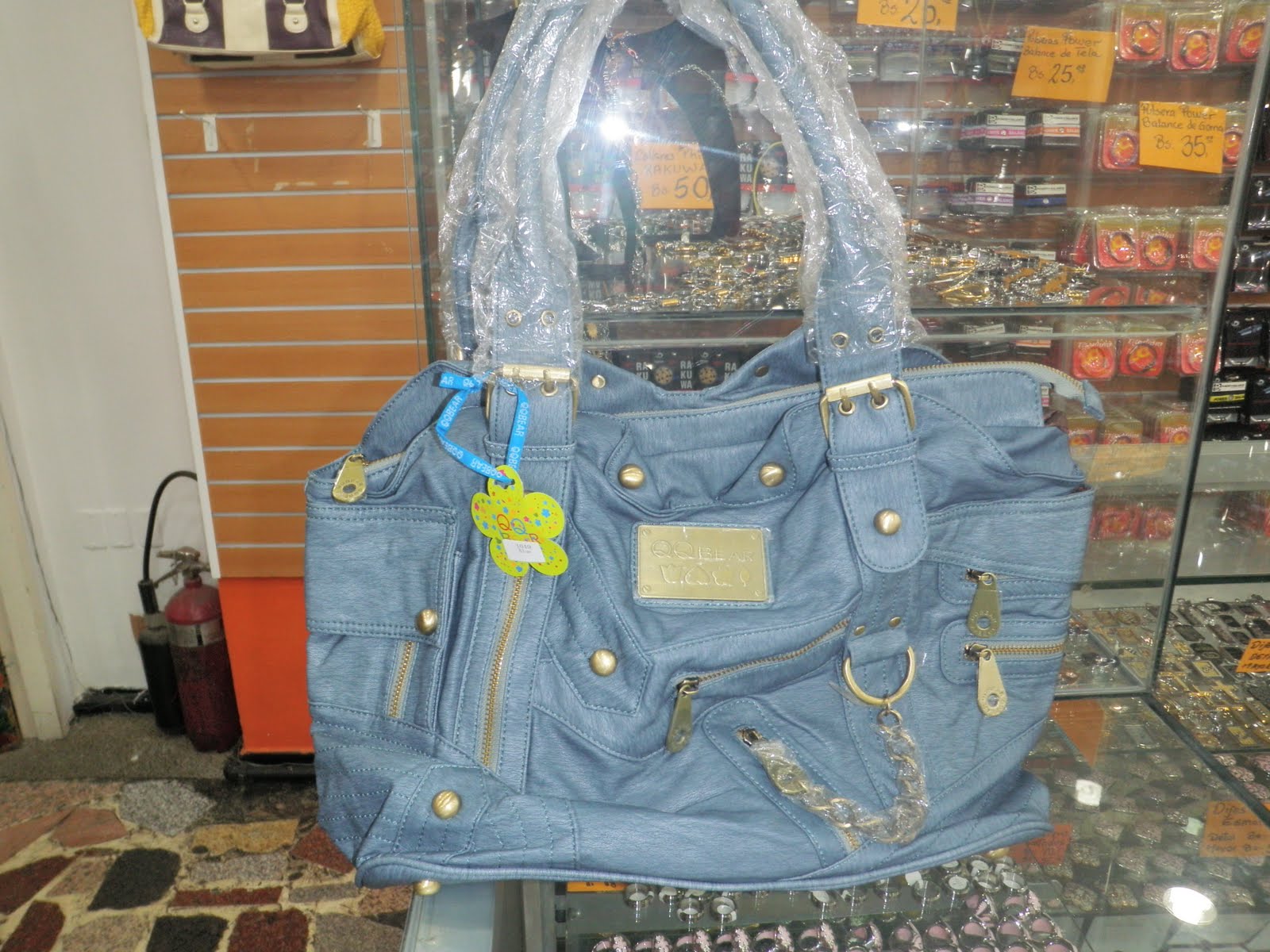 revendedor gane dinero: CARTERAS QQ BEAR COLECCION 2011 320 BS