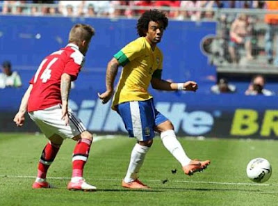 Marcelo playing for Brazil against Denmark
