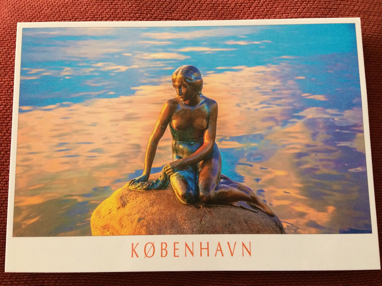 Photo of a postcard of The Little Mermaid statue
