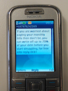 Fake Debt Writeoff SMS Text Message Scam