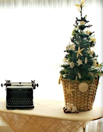potted mini Christmas tree with coastal ornaments
