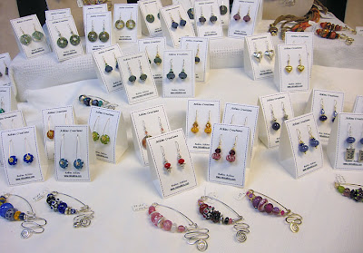 beaded earrings, fibula pins by Robin Atkins