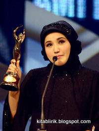 Prestasi Evie Tamala