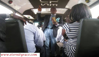 pastor preaching inside public bus