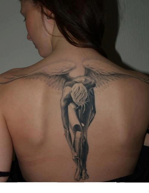 Running angel tattoo on back body