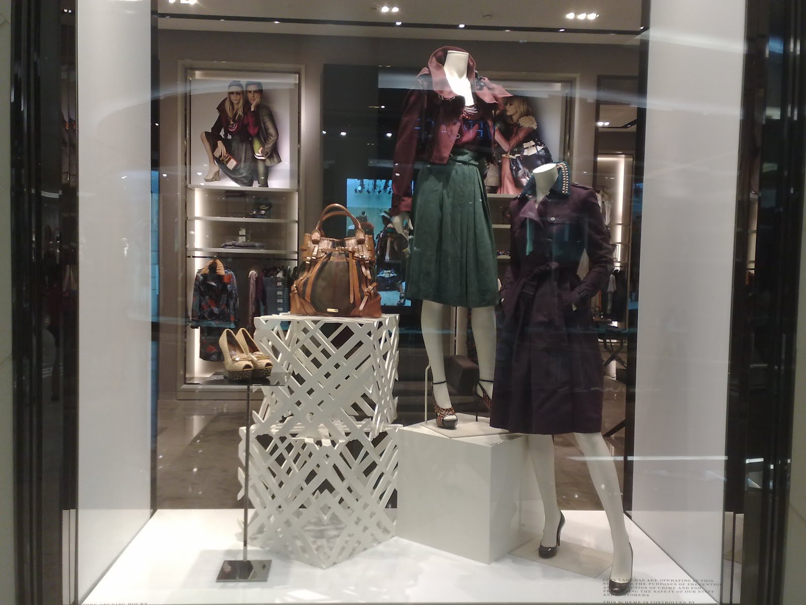 Louis Vuitton Store Window with 2 Female Mannequins Wearing Black