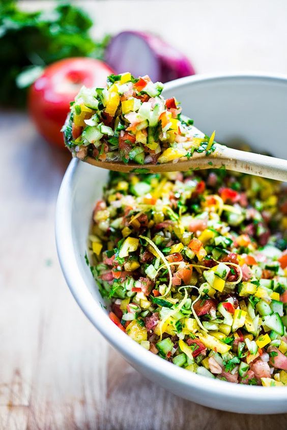 A refreshing chopped salad, called Israeli Salad, that is vegan and gluten free and goes perfectly with grilled chicken shawarma, or toasted pita and hummus or roasted spiced chickpeas or falafels!