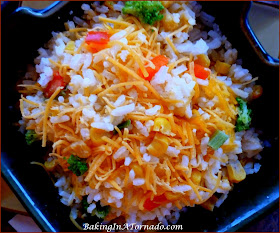 Easy Rice with Vegetables Casserole, a simple side dish put together in minute with cooked rice and chopped vegetables. A great compliment to any meal | Recipe developed by www.BakingInATornado.com | #recipe #dinner