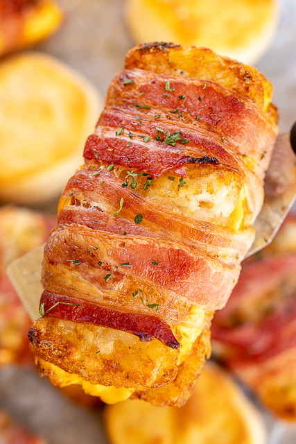 Bacon Wrapped Egg & Cheese Hash Browns - seriously DELICIOUS!!! Frozen hash brown patties stuffed with scrambled eggs and cheddar cheese and wrapped in bacon. Best breakfast EVER!!! Can make as many as you need at a time. Can assemble ahead of time and refrigerate or freeze for later. #breakfast #brunch #hashbrowns #bacon #baconeggcheese #freezermeal Bacon Wrapped Egg & Cheese Hash Browns - seriously DELICIOUS!!! Frozen hash brown patties stuffed with scrambled eggs and cheddar cheese and wrapped in bacon. Best breakfast EVER!!! Can make as many as you need at a time. Can assemble ahead of time and refrigerate or freeze for later. #breakfast #brunch #hashbrowns #bacon #baconeggcheese #freezermeal