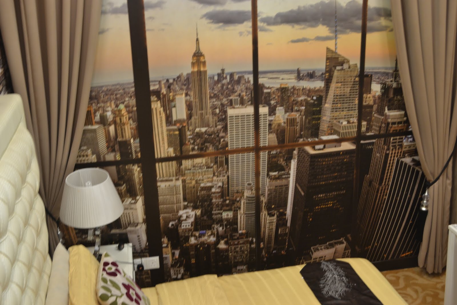 There are curtains on the window. There are curtains on the window
