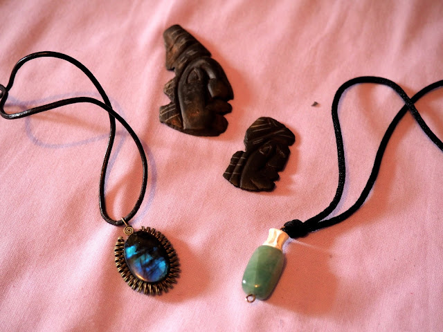 Jade necklace, blue element necklaces & Mayan stone carvings from Belize