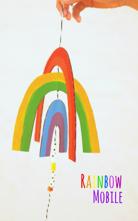How to make an easy, breezy, cardboard rainbow mobile- Super pretty and fun art project to make with kids of all ages!
